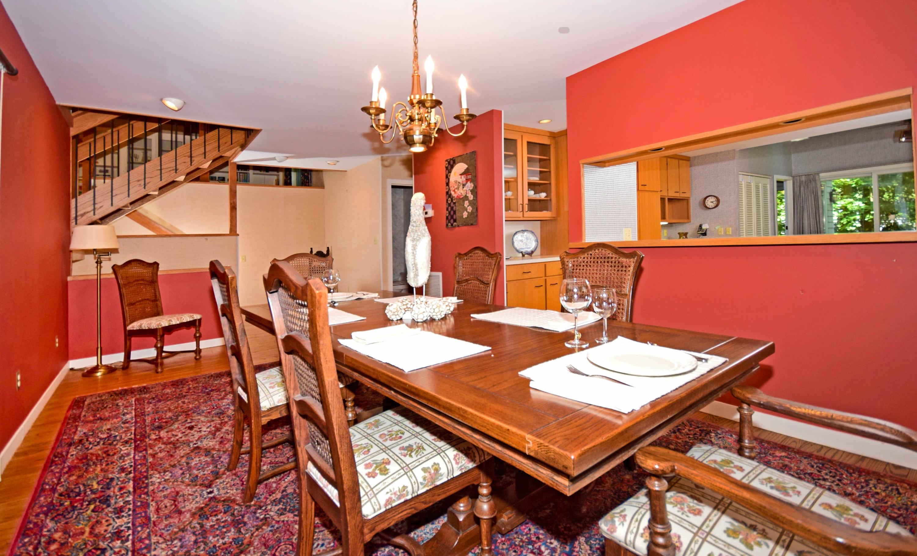 11 Wildcat Road Darien, CT 06820 - Photo 13 of 25 a view of a dining room with furniture and chandelier