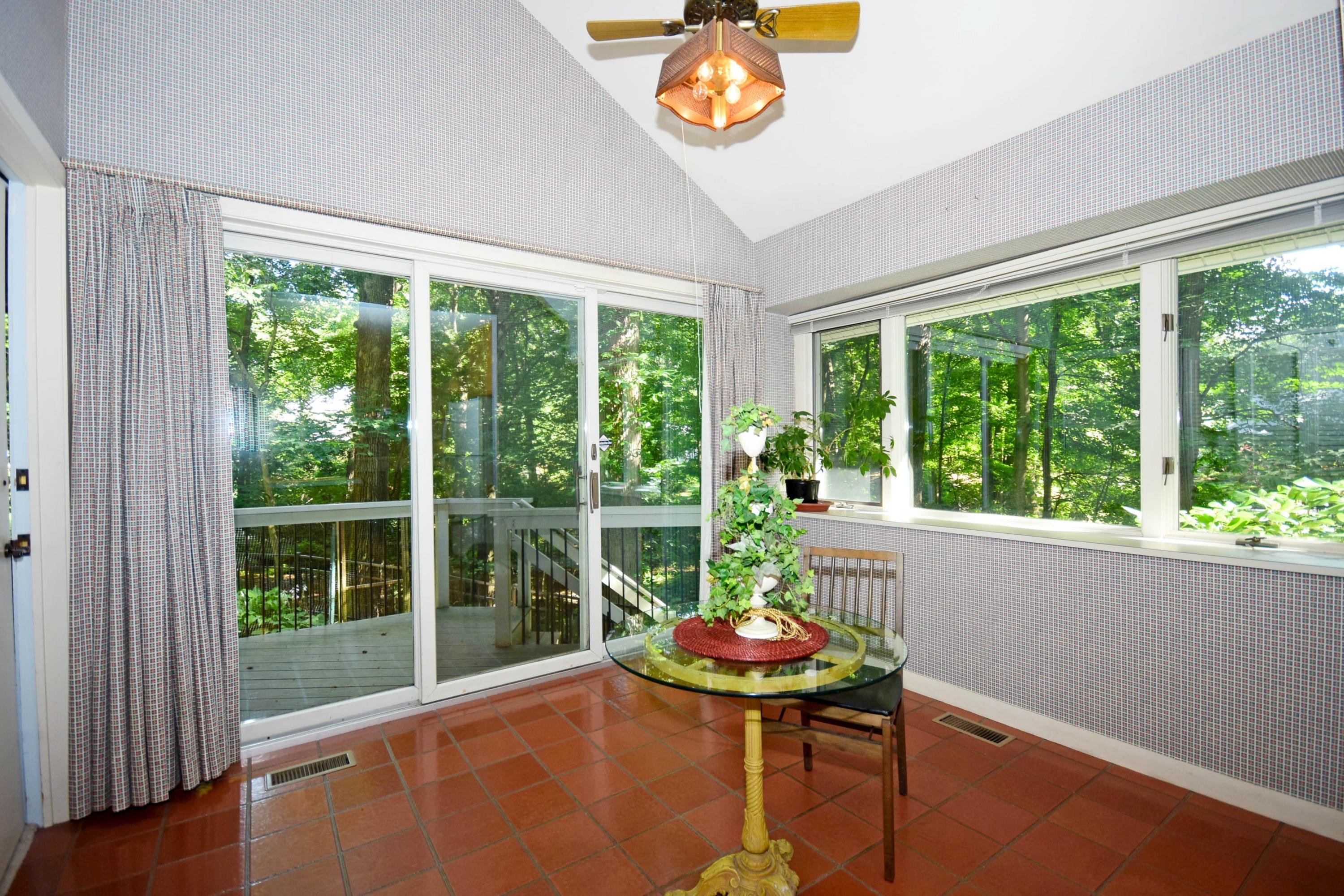 11 Wildcat Road Darien, CT 06820 - Photo 18 of 25 a view of a dining room with furniture window and outside view