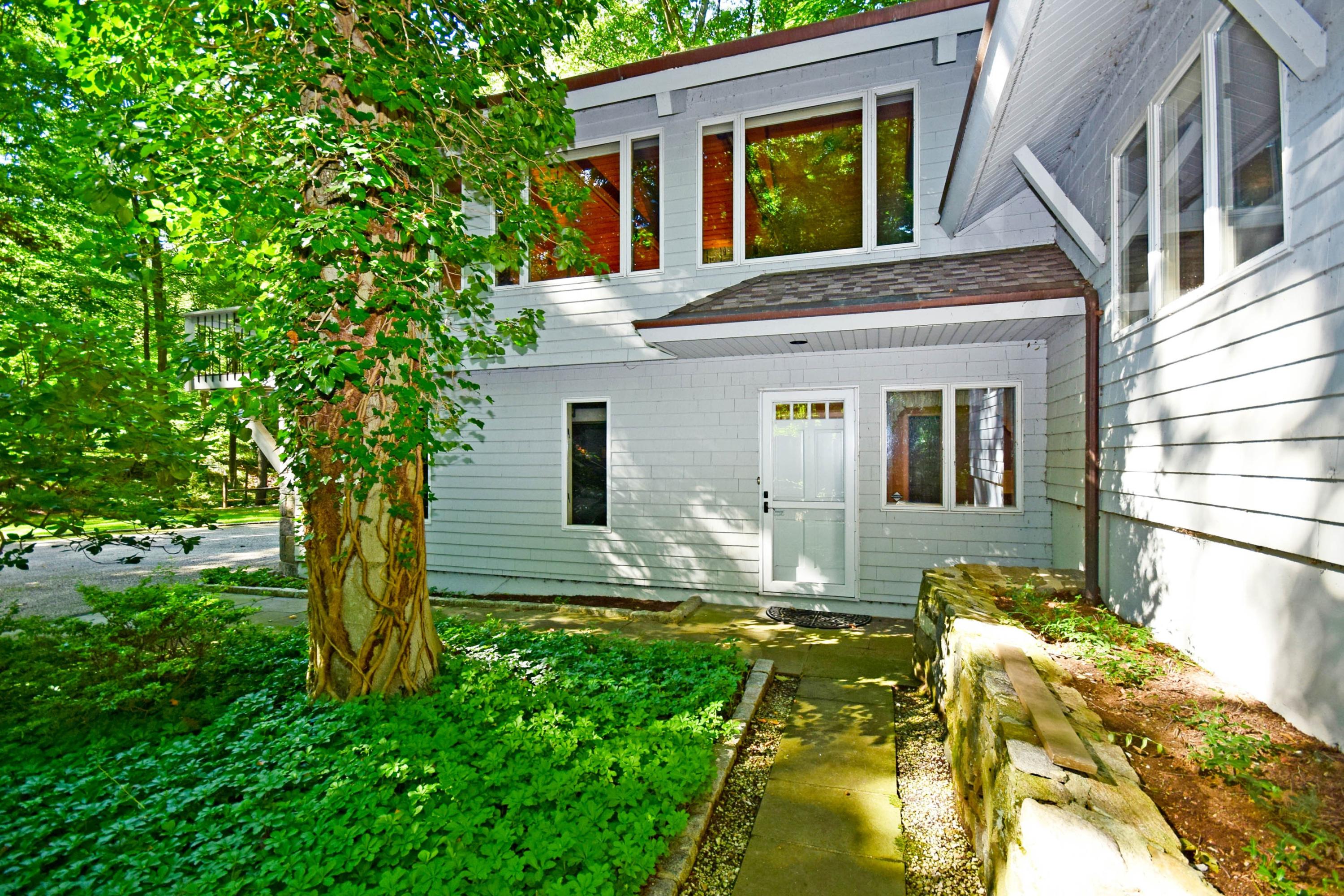 11 Wildcat Road Darien, CT 06820 - Photo 2 of 25 a view of house with a yard