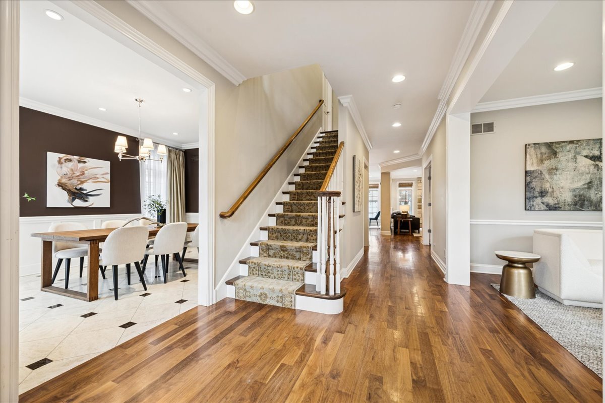 343 Washington Avenue Glencoe, IL 60022 - Photo 2 of 35 a view of entryway with wooden floor and stairs