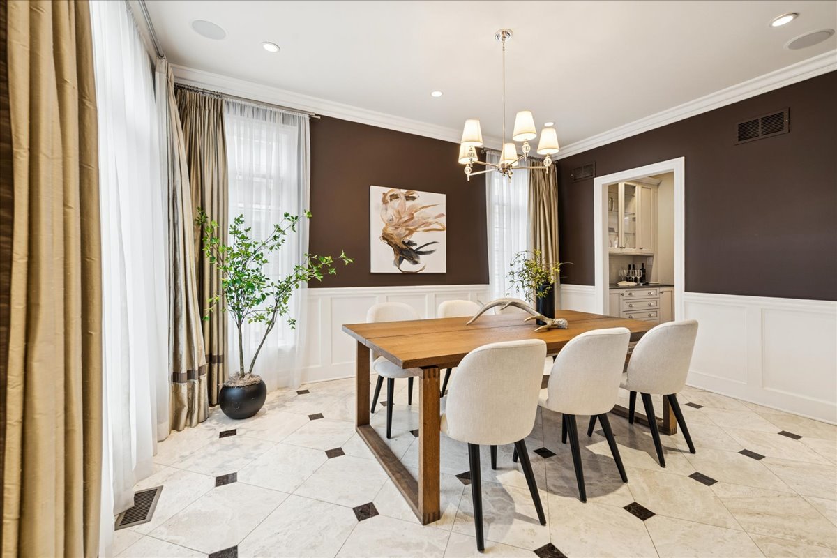 343 Washington Avenue Glencoe, IL 60022 - Photo 5 of 35 a view of a dining room with furniture and a chandelier