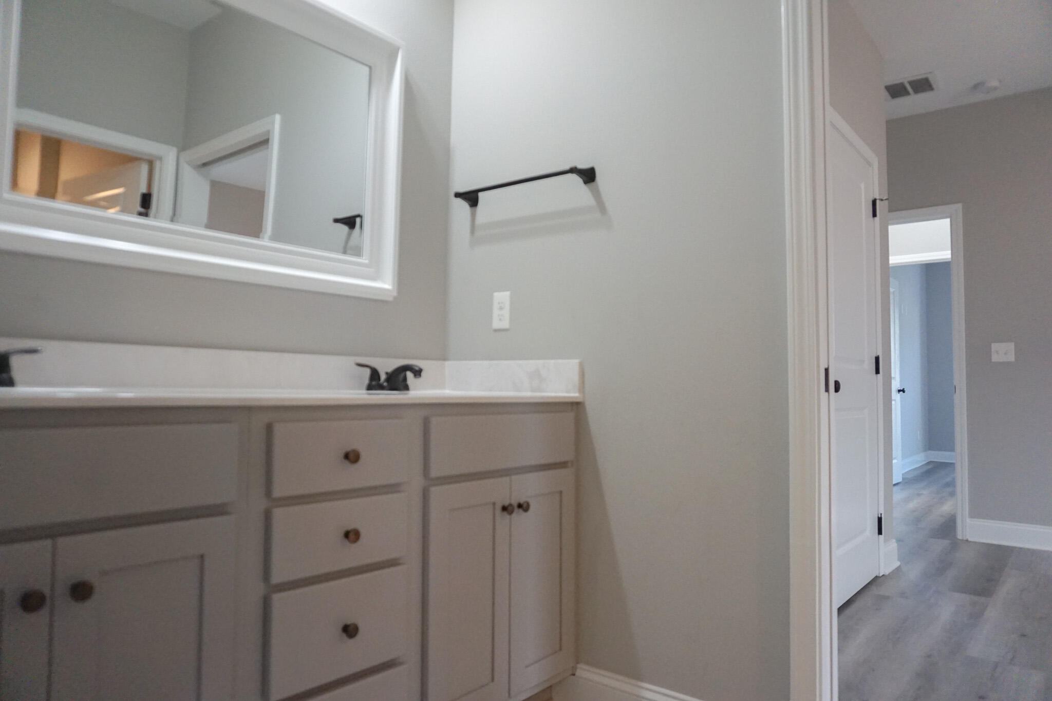 48 9th Avenue Shalimar, FL 32579 - Photo 20 of 60 a bathroom with a sink and a mirror