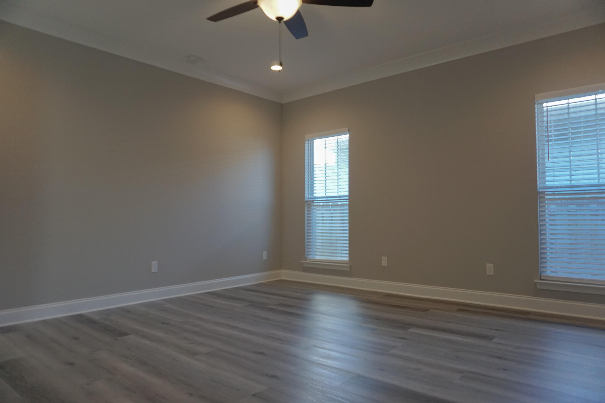 48 9th Avenue Shalimar, FL 32579 - Photo 25 of 60 an empty room with wooden floor and windows