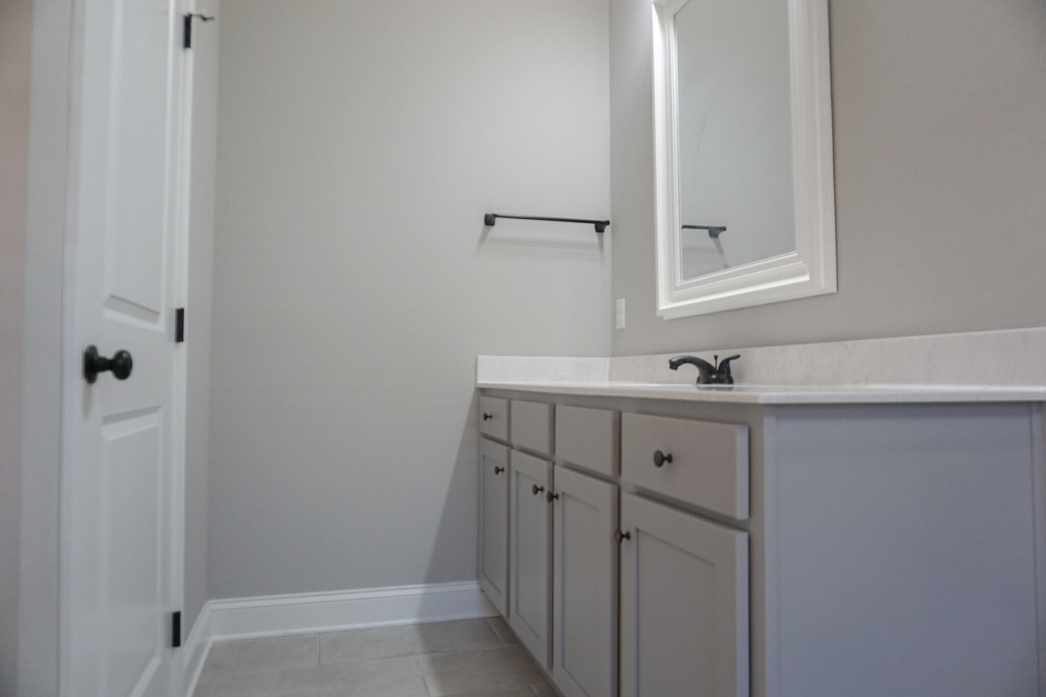 48 9th Avenue Shalimar, FL 32579 - Photo 29 of 60 a bathroom with a sink and mirror