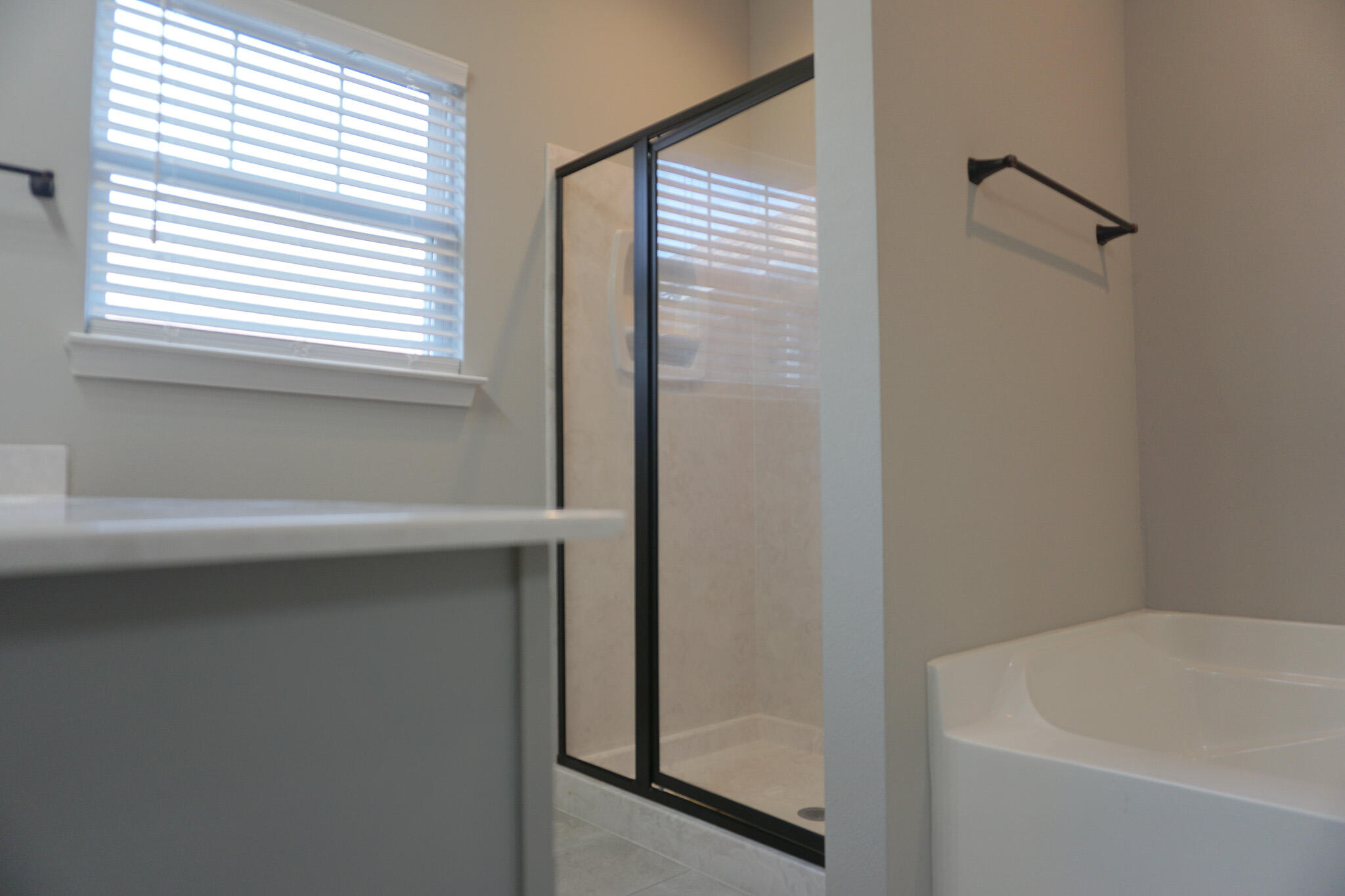48 9th Avenue Shalimar, FL 32579 - Photo 31 of 60 a bathroom with a bathtub and a shower