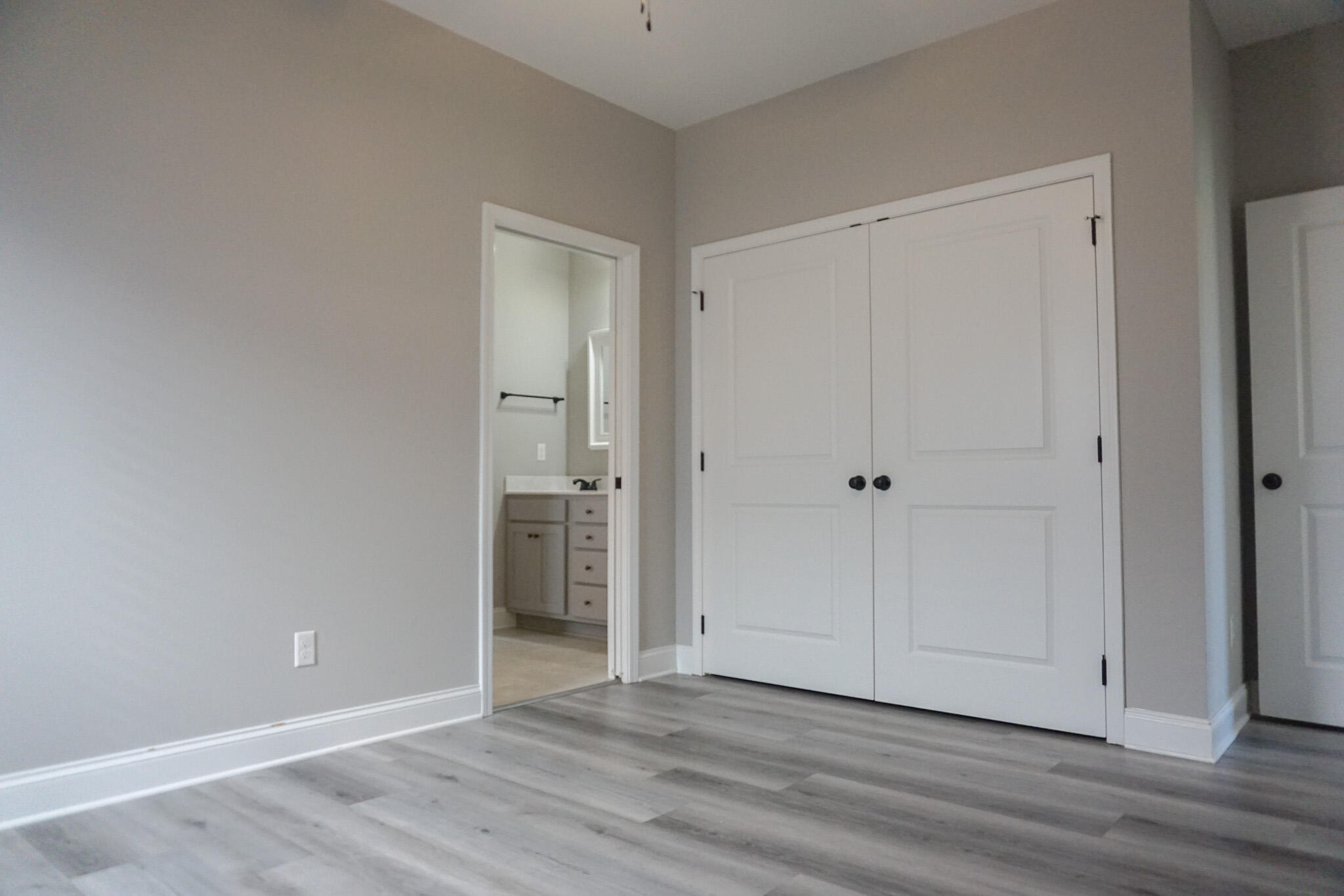 48 9th Avenue Shalimar, FL 32579 - Photo 43 of 60 a view of an empty room with wooden floor