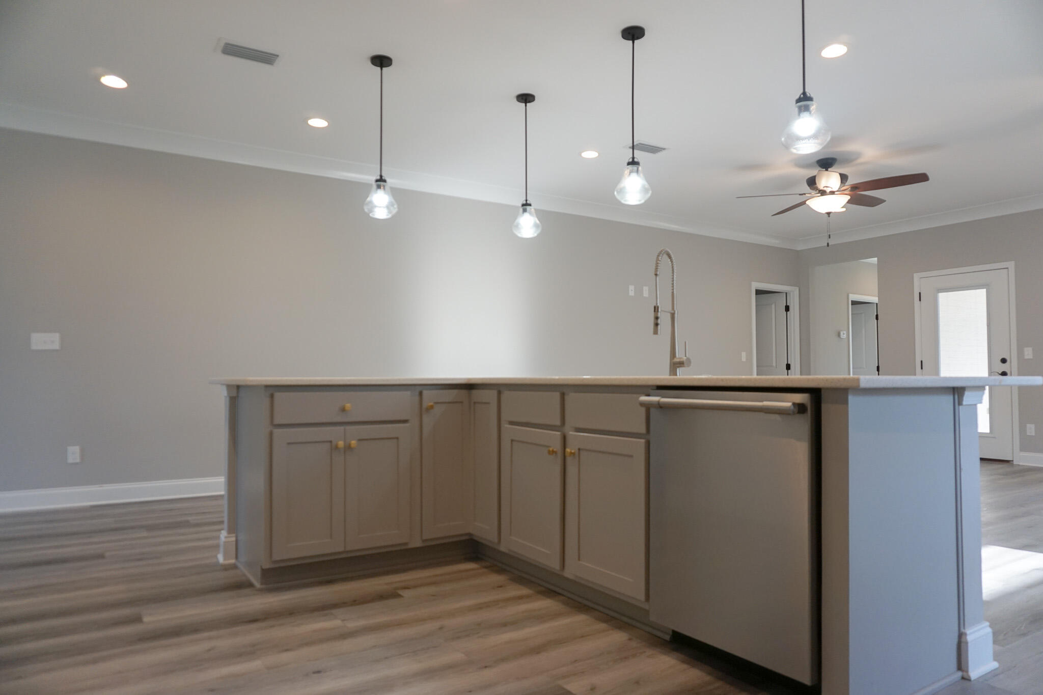 48 9th Avenue Shalimar, FL 32579 - Photo 7 of 60 a view of a kitchen with a dishwasher cabinets and wooden floor