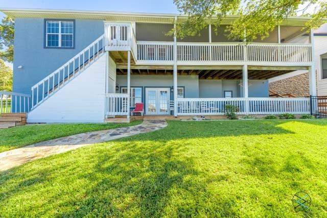 6209 Point La Vista Road Malakoff, TX 75148 - Photo 29 of 38 a view of house with backyard and deck