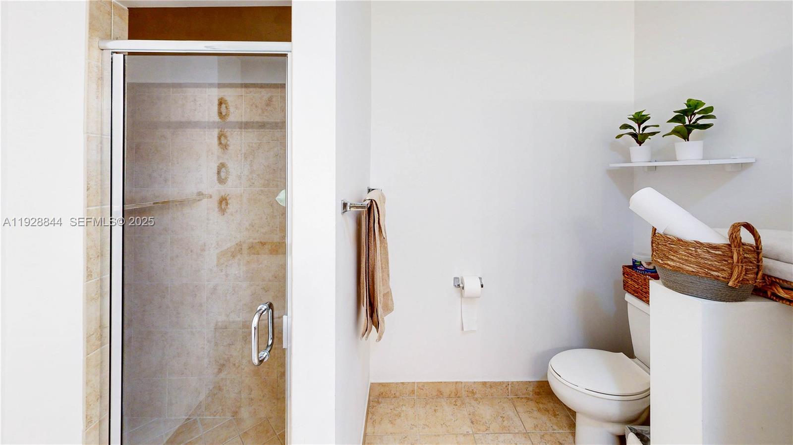 3090 Southeast 7th Court Homestead, FL 33033 - Photo 29 of 80 a bathroom with a toilet and a shower