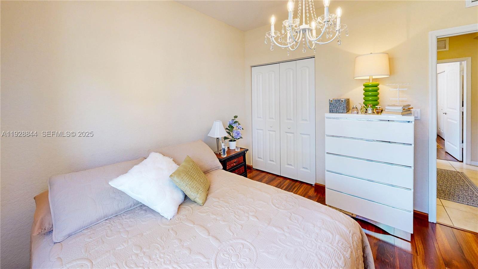 3090 Southeast 7th Court Homestead, FL 33033 - Photo 32 of 80 a bedroom with a bed and a dresser