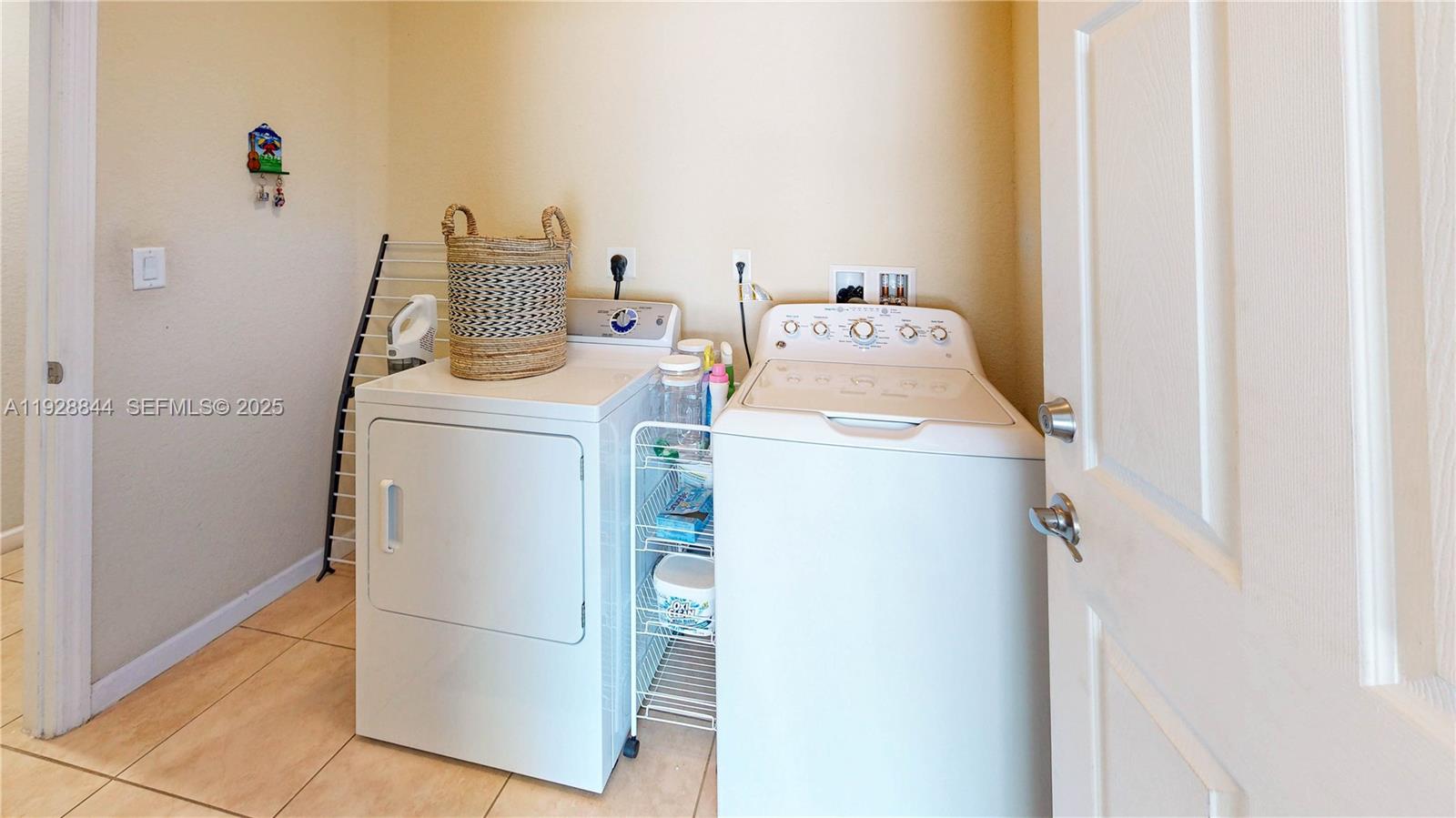 3090 Southeast 7th Court Homestead, FL 33033 - Photo 37 of 80 a utility room with dryer and washer