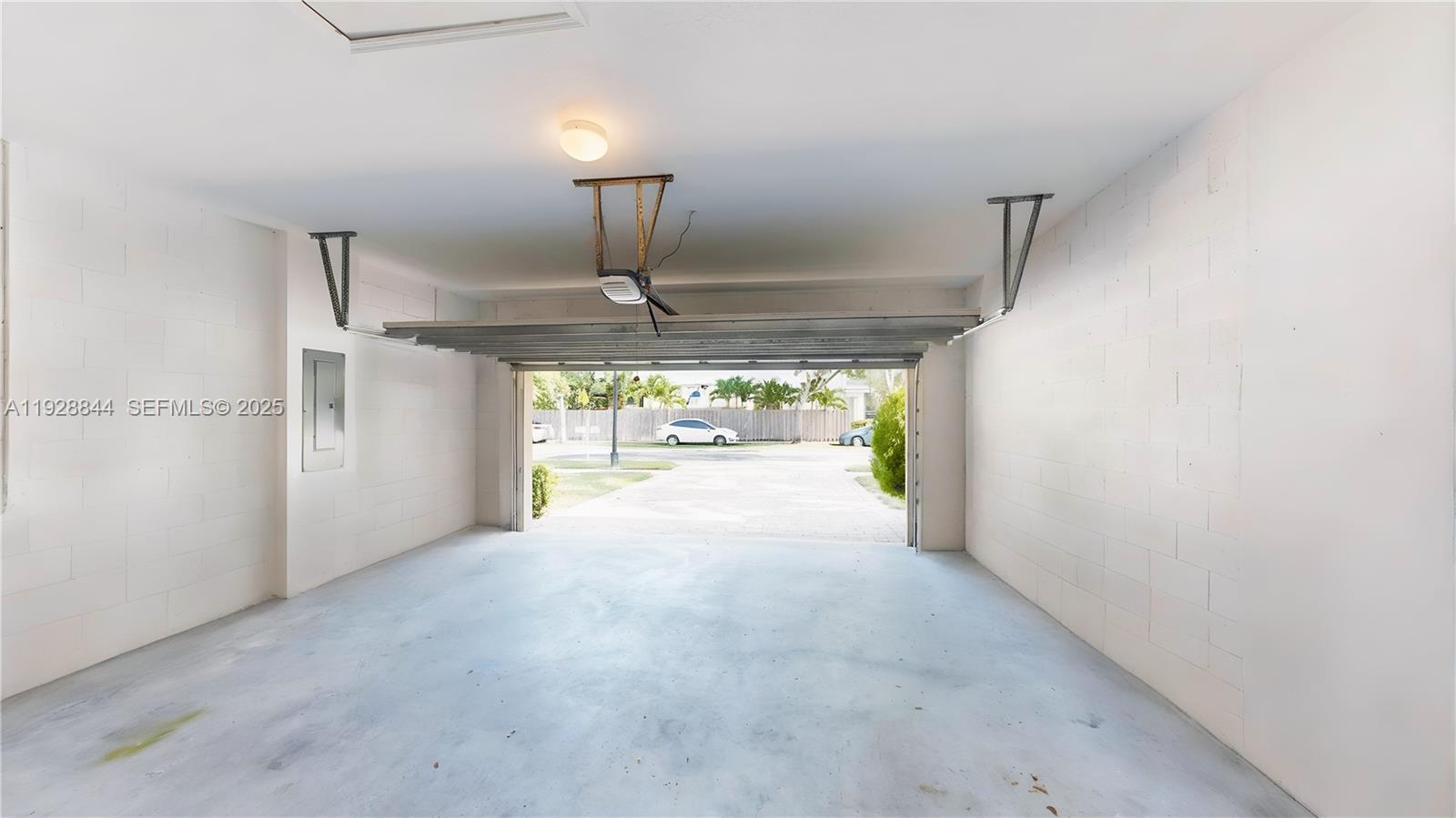 3090 Southeast 7th Court Homestead, FL 33033 - Photo 39 of 80 a view of a livingroom with a chandelier