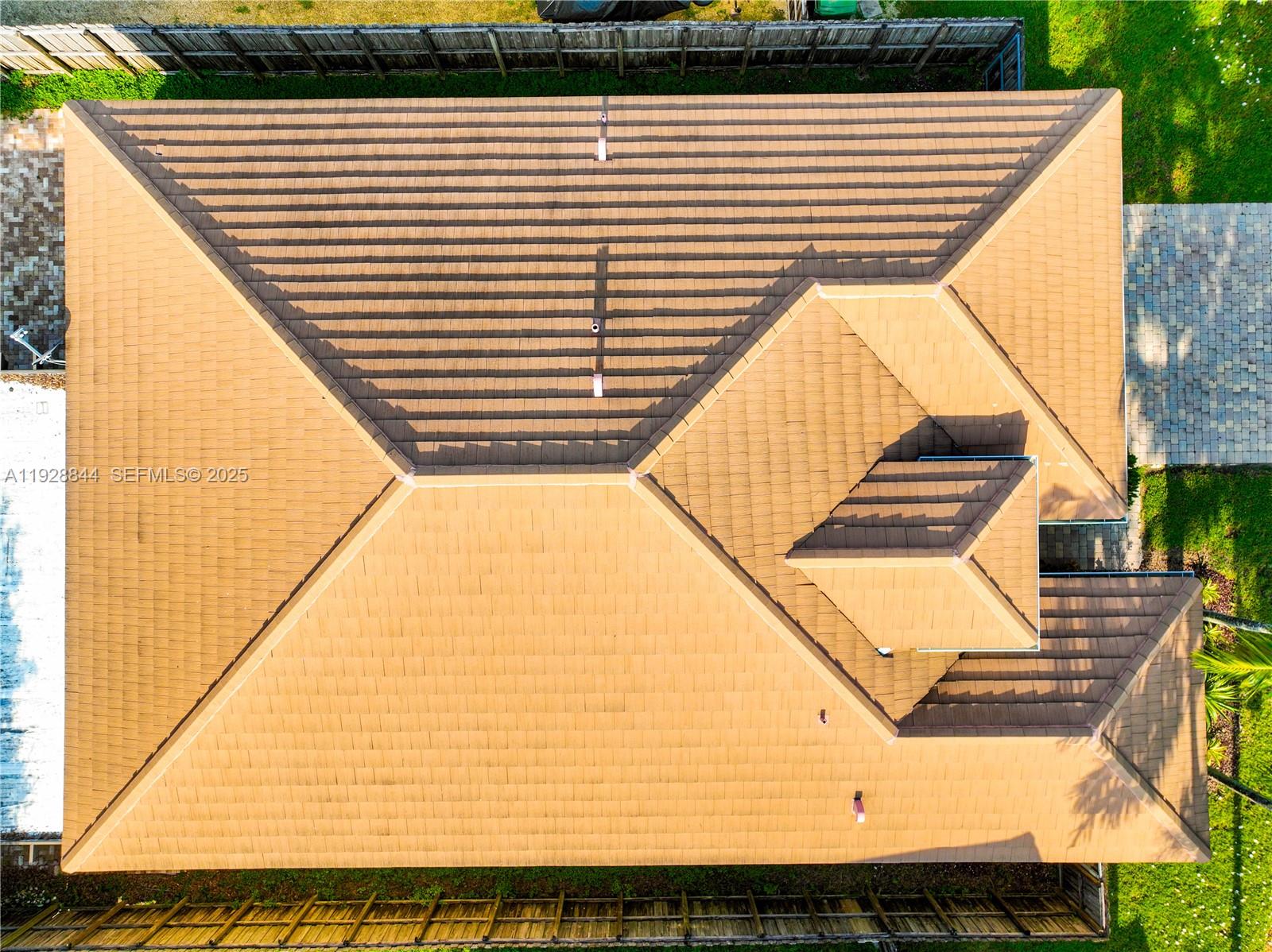 3090 Southeast 7th Court Homestead, FL 33033 - Photo 55 of 80 a view of a balcony with wooden floor and a potted plant