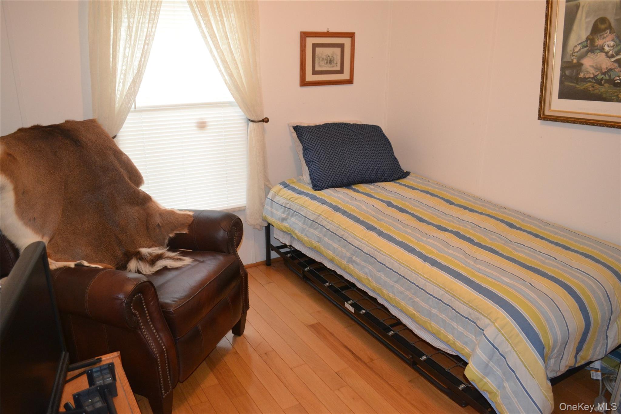144 Bonnie Brook Road Roscoe, NY 12776 - Photo 16 of 34 Bedroom featuring wood-type flooring