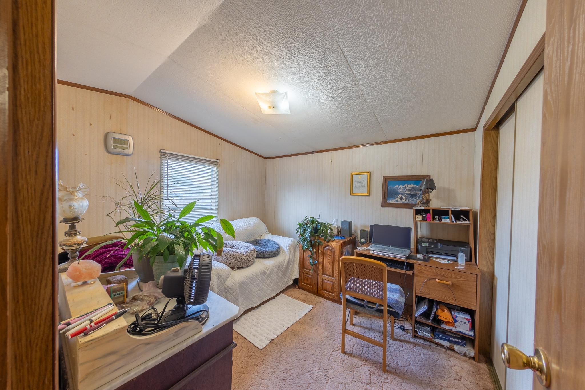 219 Honeysuckle Circle Fruita, CO 81521 - Photo 8 of 16 a living room with furniture and flowers