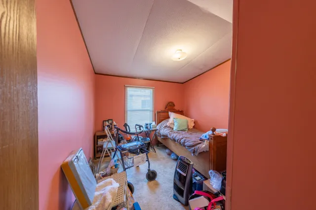 a room with furniture and air hockey table