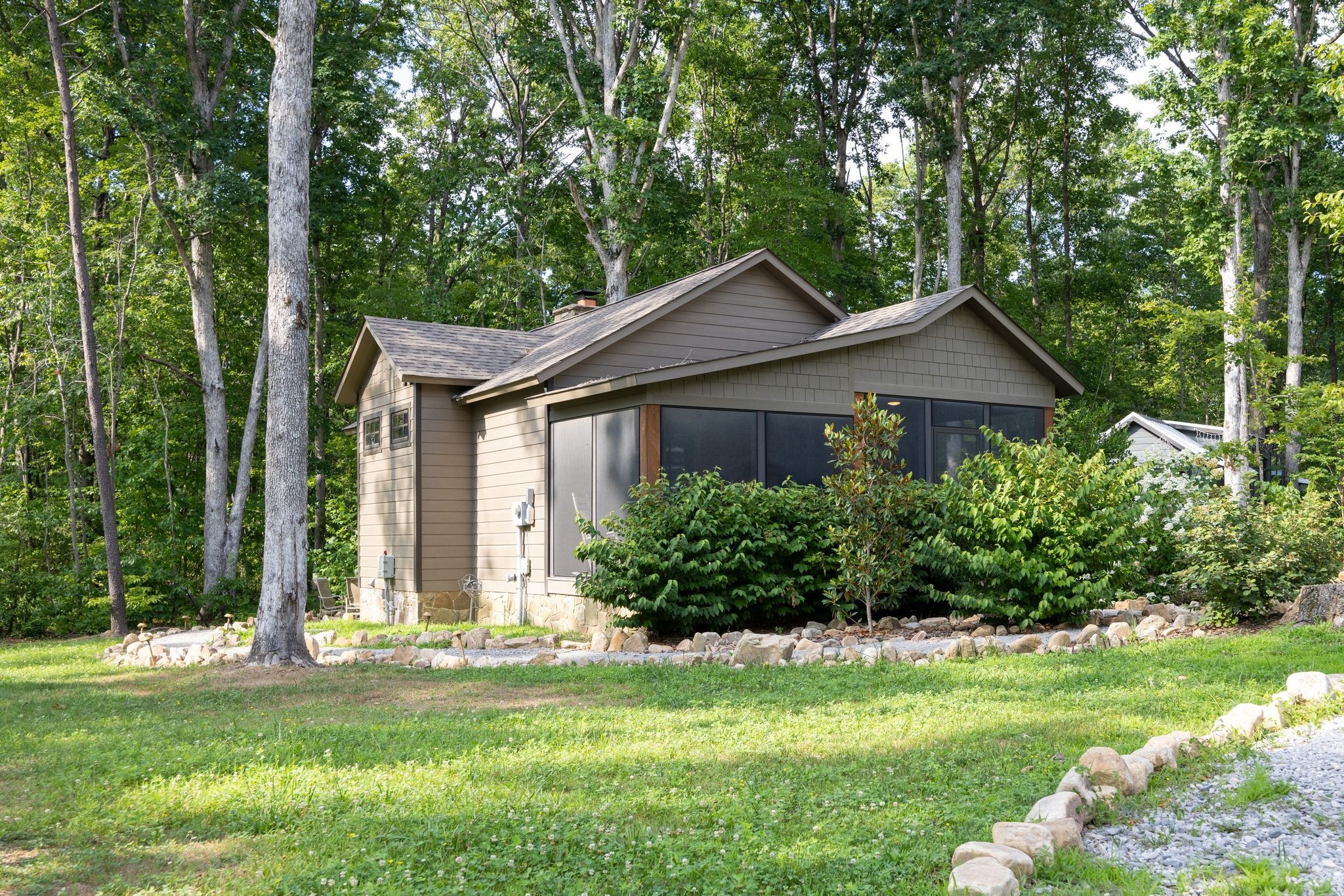 292 Waters Edge Way Tracy City, TN 37387 - Photo 3 of 17 a front view of a house with a yard