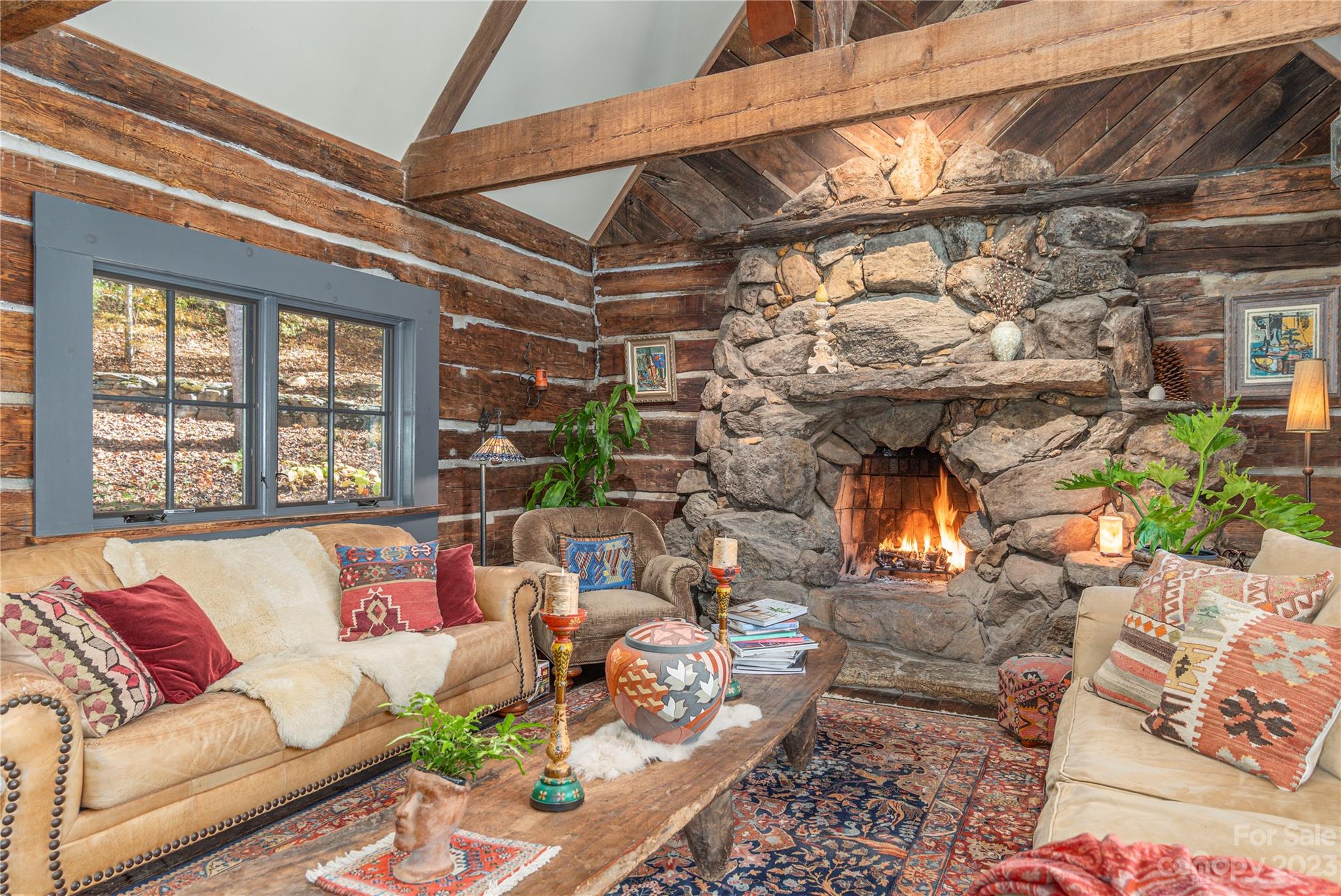 33 Taproot Trail Barnardsville, NC 28709 - Photo 2 of 46 a living room with furniture and a floor to ceiling window