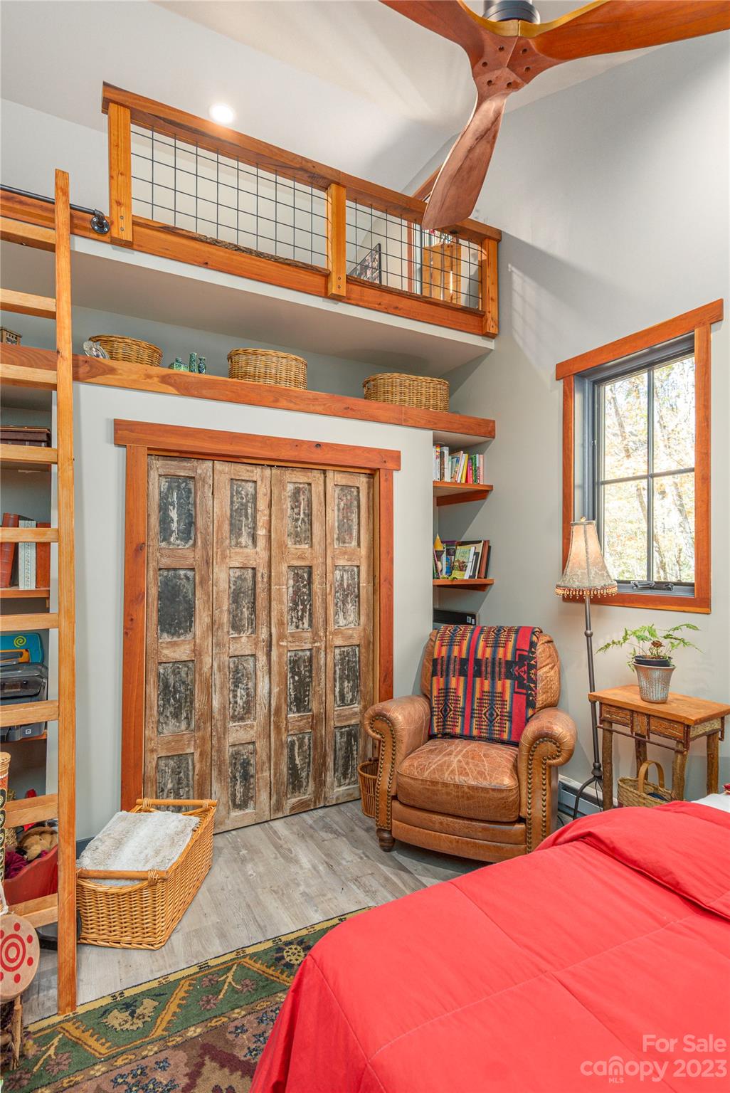 33 Taproot Trail Barnardsville, NC 28709 - Photo 21 of 46 a bedroom with a bed and a large window