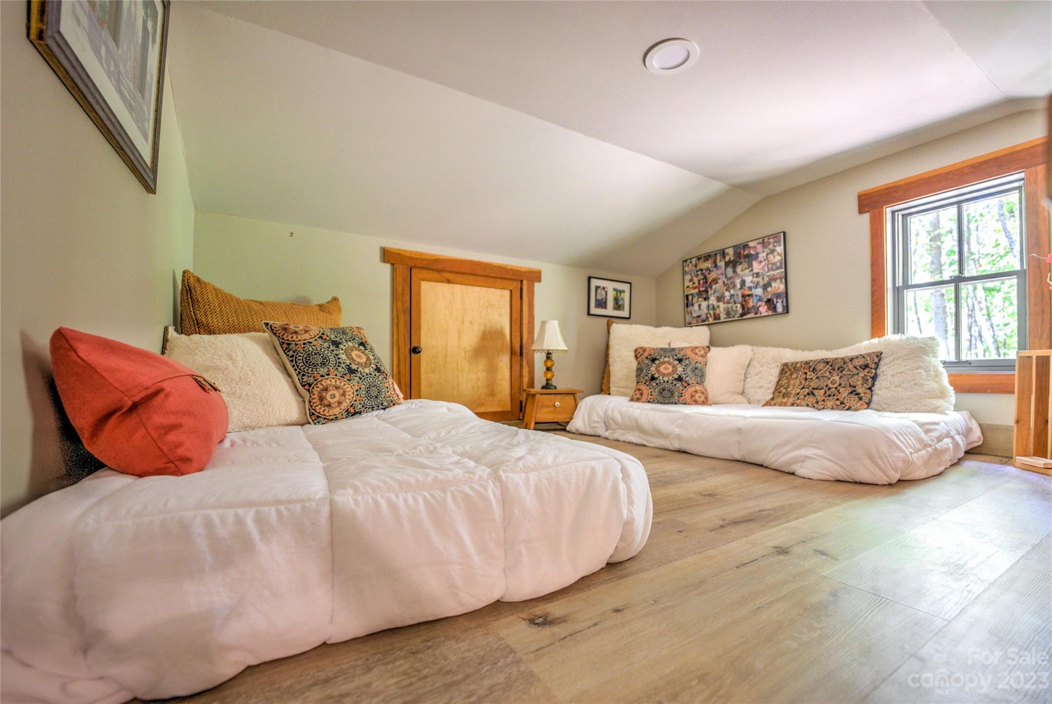 33 Taproot Trail Barnardsville, NC 28709 - Photo 22 of 46 a bedroom with bed and a large window
