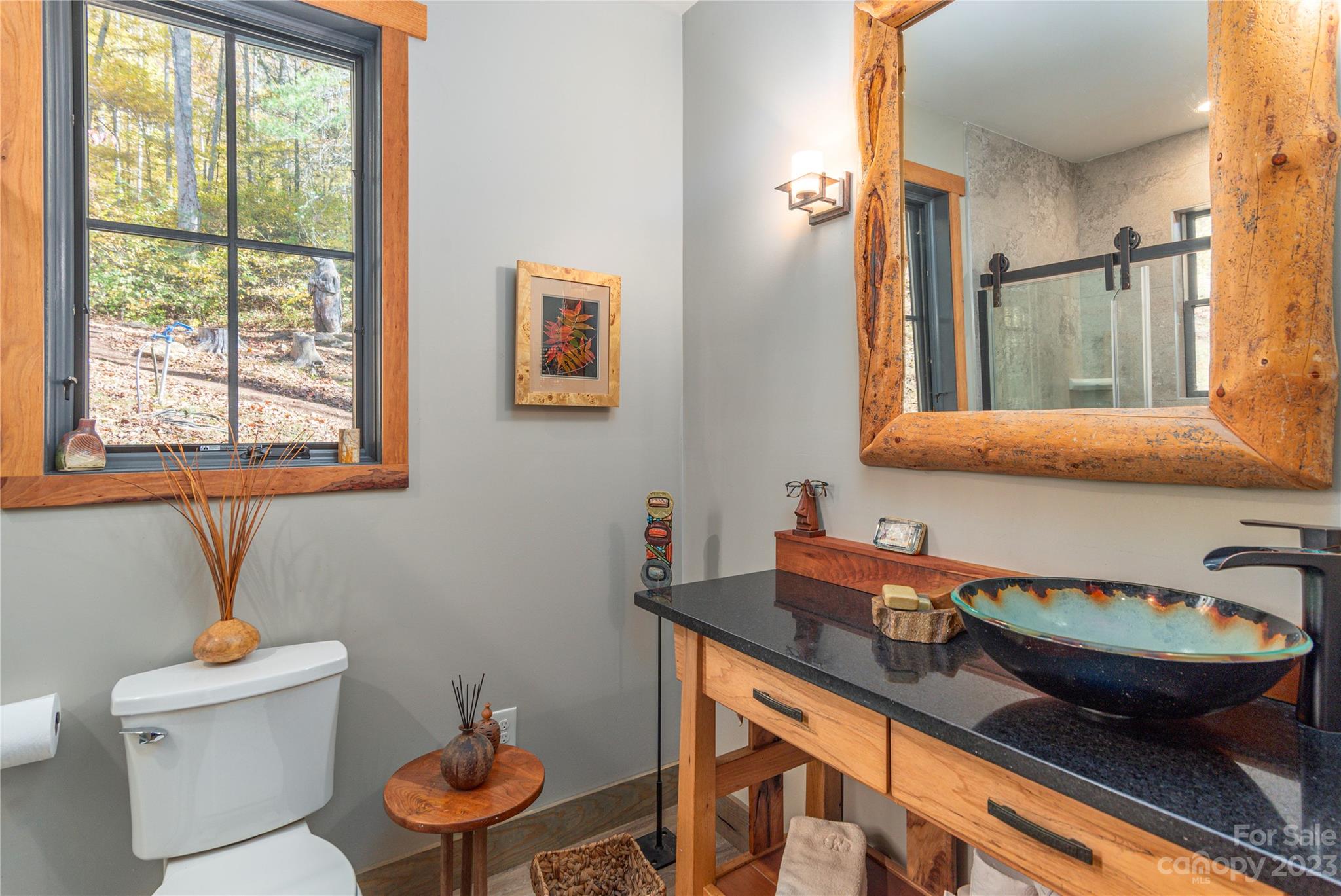 33 Taproot Trail Barnardsville, NC 28709 - Photo 24 of 46 a bathroom with a granite countertop sink and a mirror