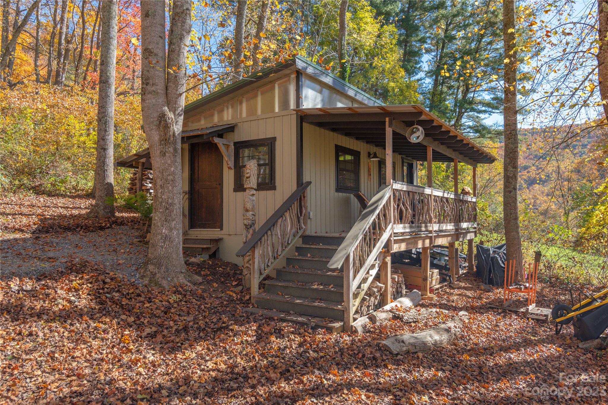 33 Taproot Trail Barnardsville, NC 28709 - Photo 31 of 46 a front view of house with deck and outdoor seating