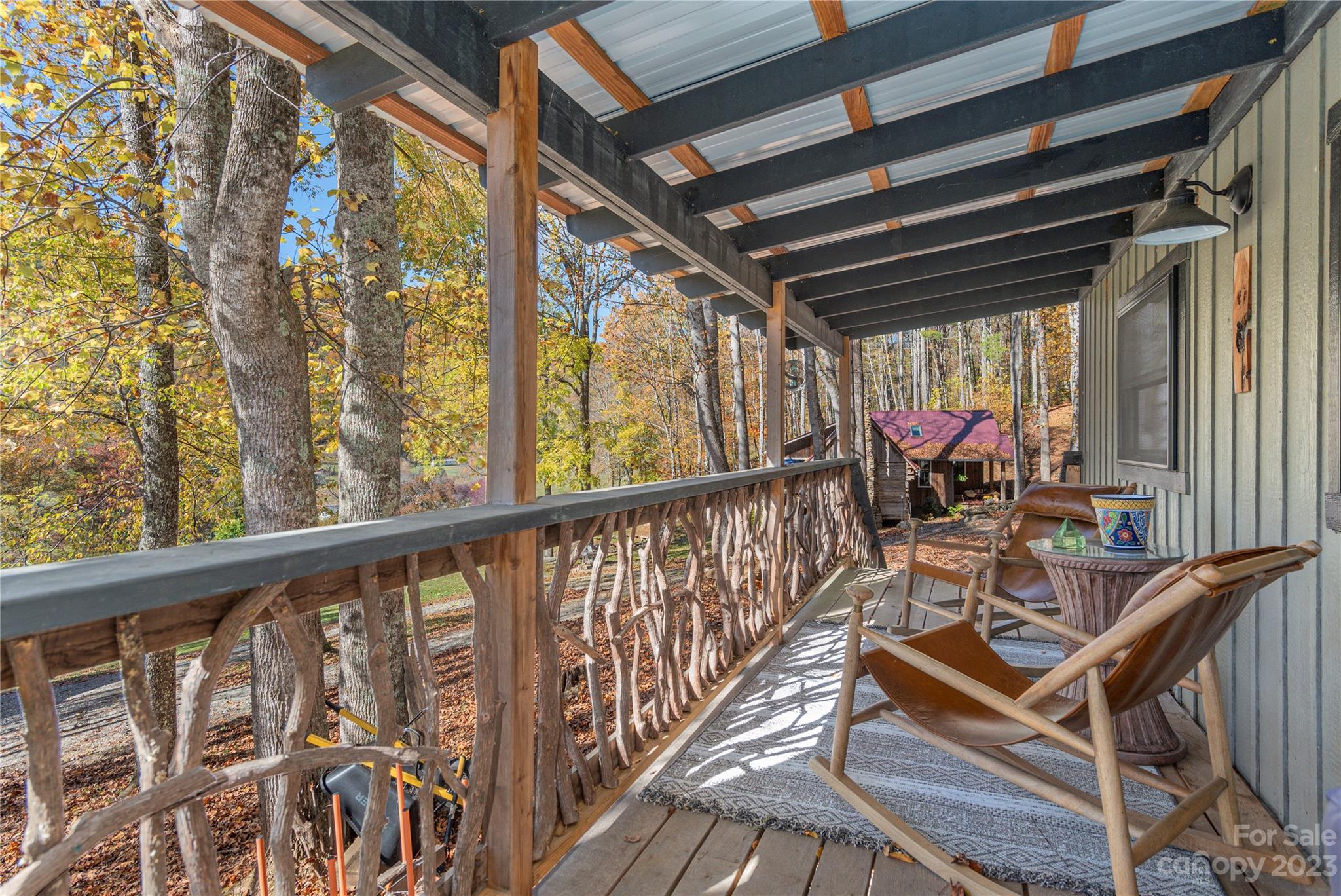 33 Taproot Trail Barnardsville, NC 28709 - Photo 34 of 46 a view of a chairs and table in the balcony