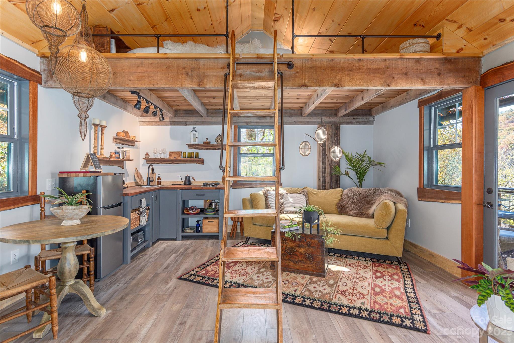 33 Taproot Trail Barnardsville, NC 28709 - Photo 36 of 46 a living room with furniture and a window