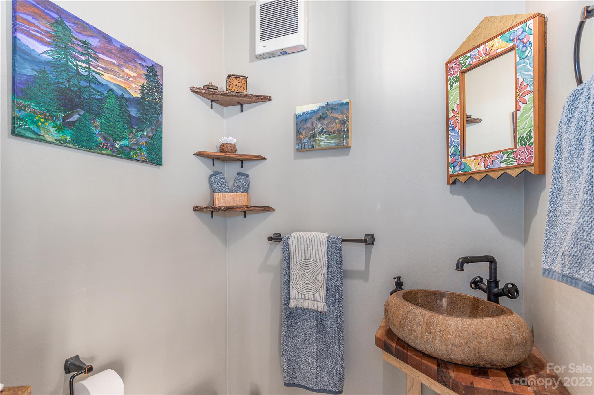 33 Taproot Trail Barnardsville, NC 28709 - Photo 39 of 46 a bathroom with a sink mirror and vanity