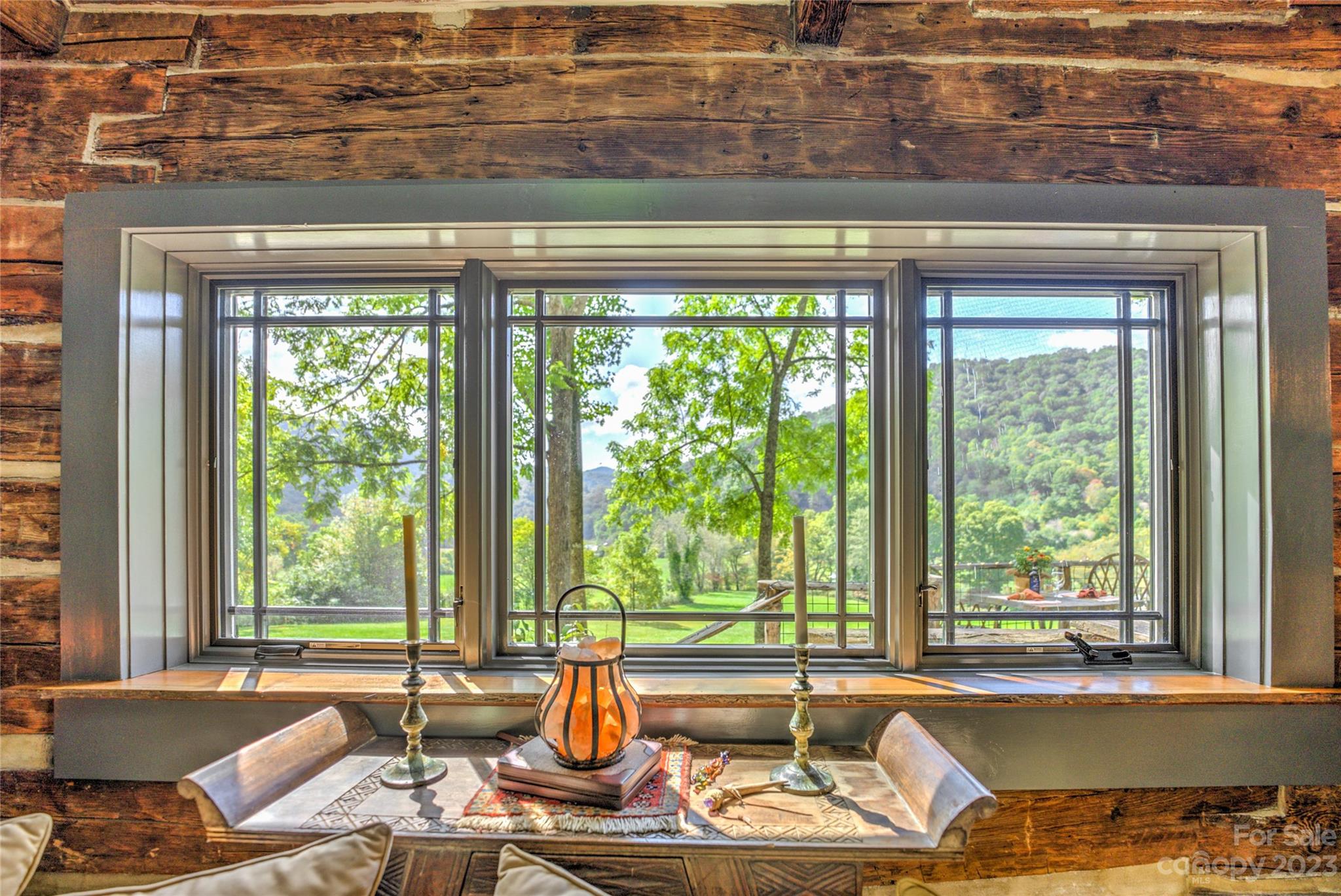 33 Taproot Trail Barnardsville, NC 28709 - Photo 4 of 46 a living room with furniture and large windows