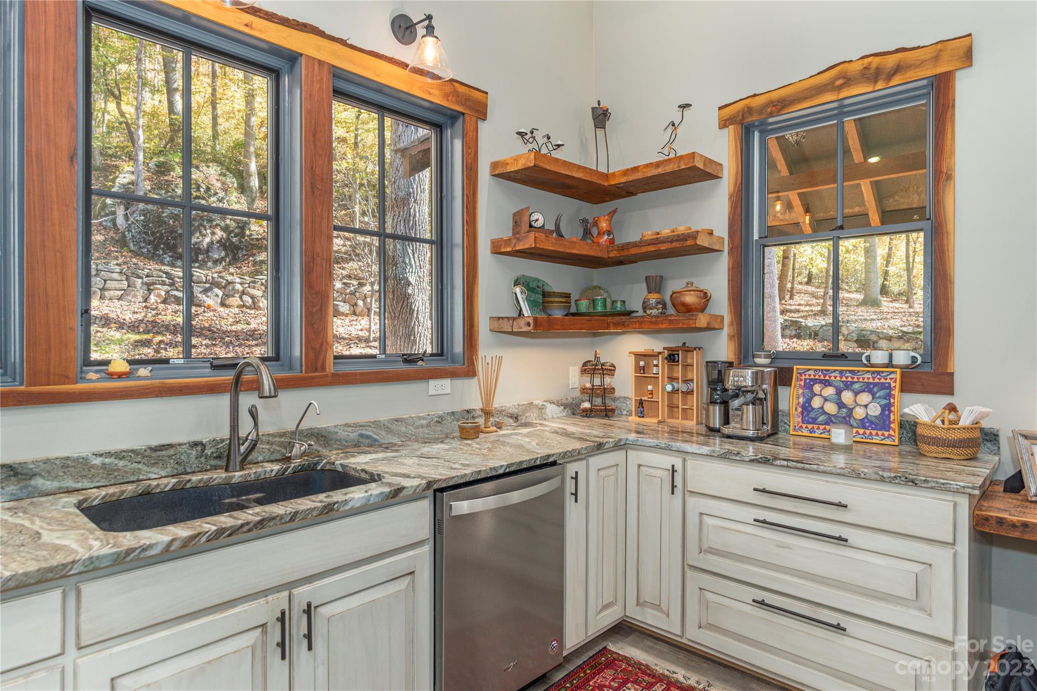 33 Taproot Trail Barnardsville, NC 28709 - Photo 8 of 46 a kitchen with granite countertop a sink and a window