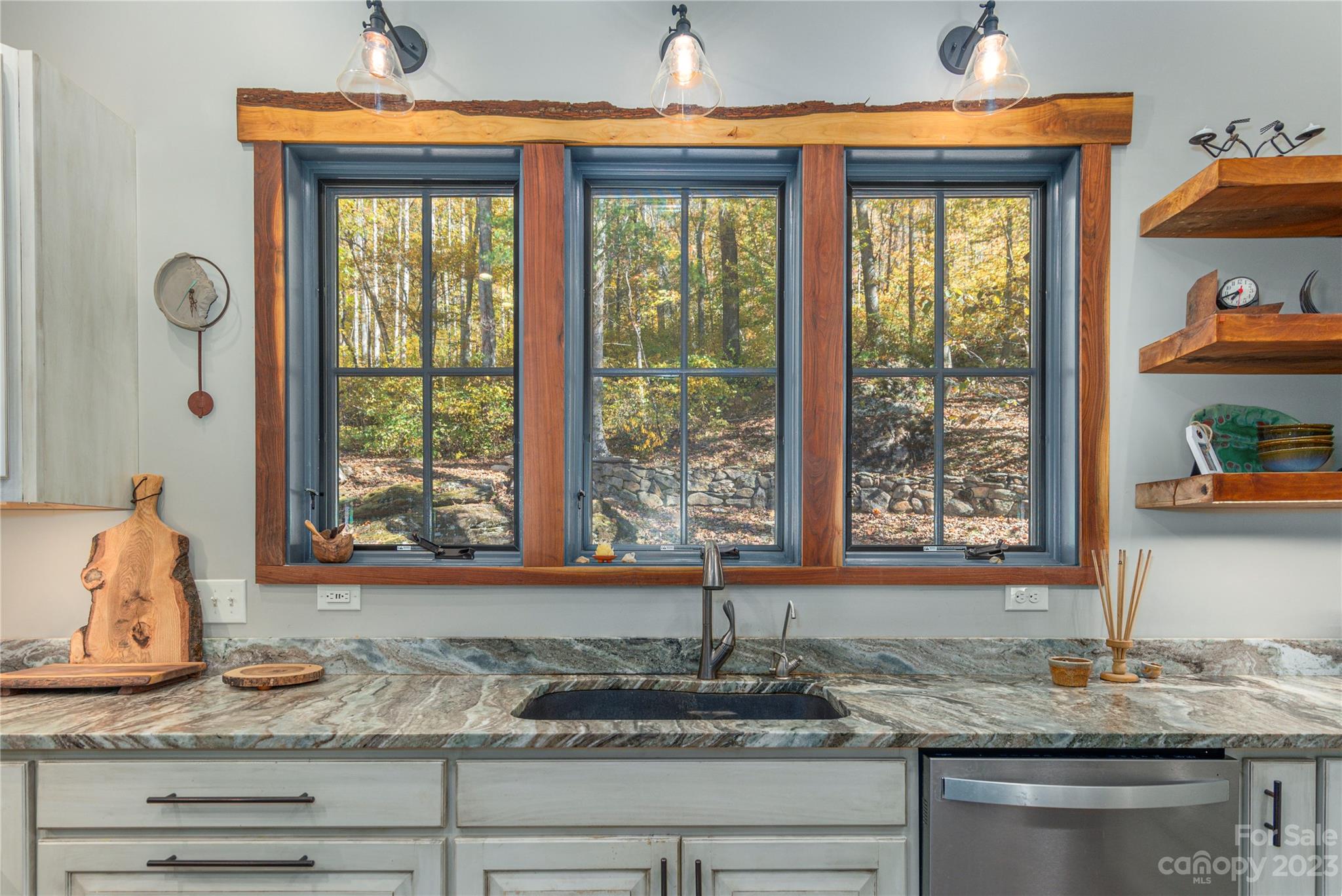33 Taproot Trail Barnardsville, NC 28709 - Photo 9 of 46 a kitchen with granite countertop a sink and a window