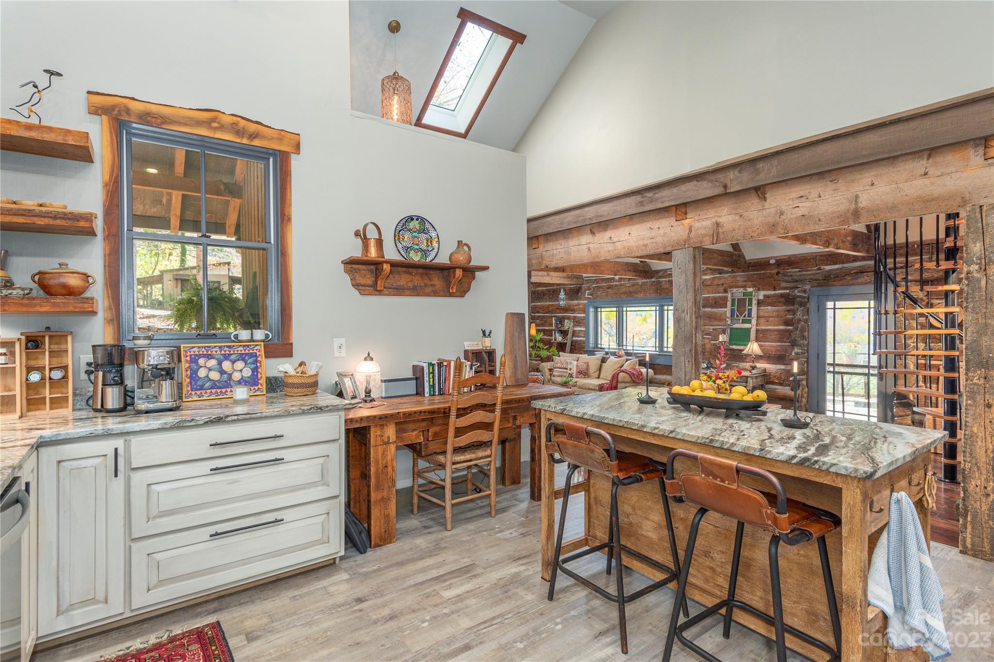 33 Taproot Trail Barnardsville, NC 28709 - Photo 10 of 46 a kitchen with a table and chairs in it