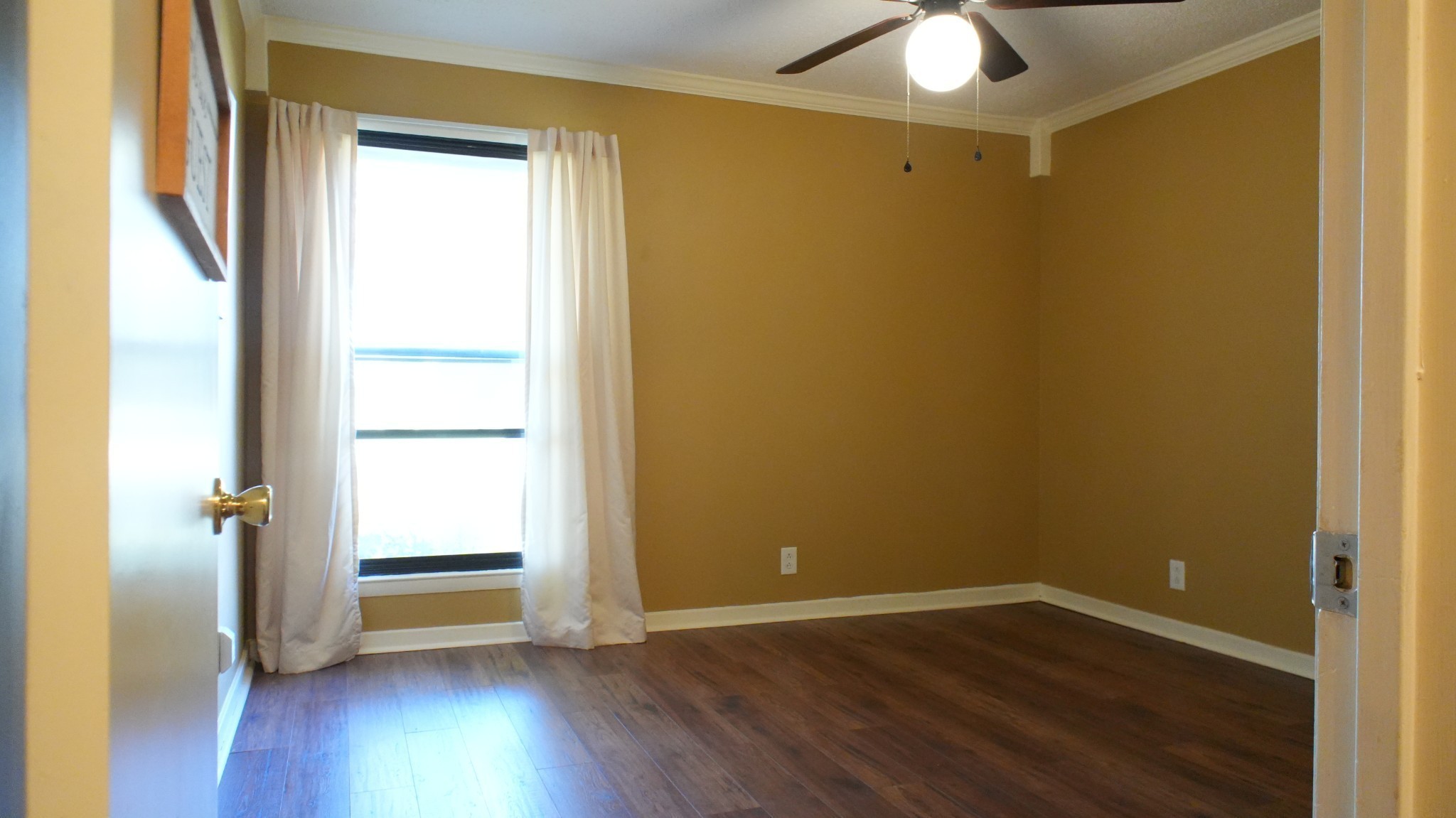 220 Harpers Mill Road Hermitage, TN 37076 - Photo 26 of 48 an empty room with wooden floor and windows