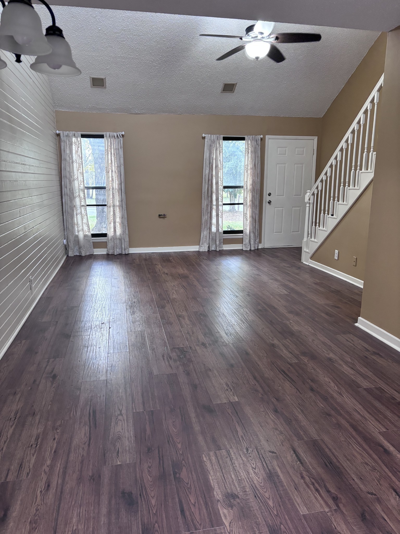 220 Harpers Mill Road Hermitage, TN 37076 - Photo 8 of 48 a view of an empty room with wooden floor and window