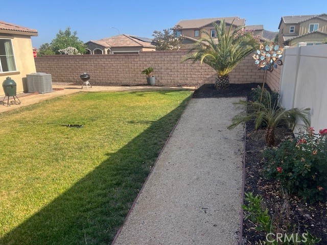 29901 Bridlegate Way Menifee, CA 92584 - Photo 32 of 43 a view of a house with a yard and ocean view