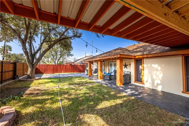 a view of a backyard with a small cabin