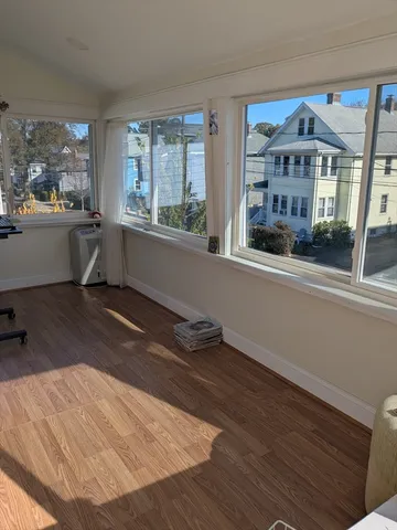 a view of cabinets a sink and dishwasher in a room