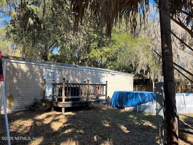 104 Lunker Lodge Road Georgetown, FL 32139 - Photo 17 of 19 a view of a house with backyard and sitting area