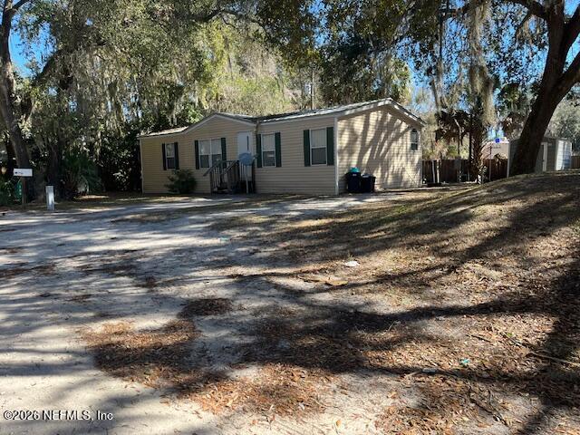 104 Lunker Lodge Road Georgetown, FL 32139 - Photo 19 of 19 a view of a house with a yard