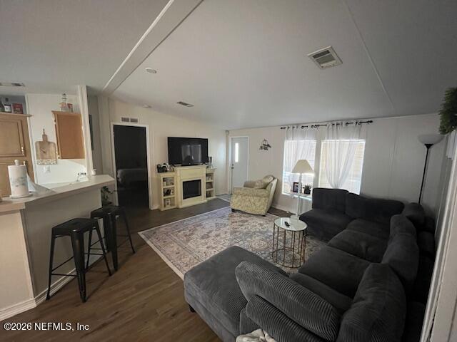 104 Lunker Lodge Road Georgetown, FL 32139 - Photo 5 of 19 a living room with furniture wooden floor and a flat screen tv