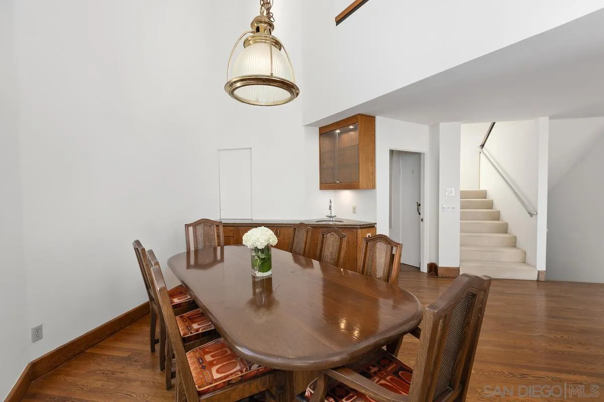 1888 Puente Drive La Jolla, CA 92037 - Photo 12 of 30 a view of a dining room with furniture and wooden floor