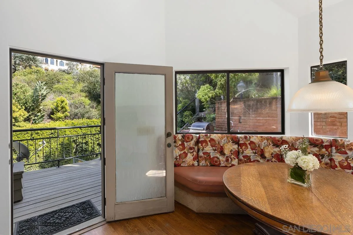 1888 Puente Drive La Jolla, CA 92037 - Photo 18 of 30 a living room with furniture and a large window
