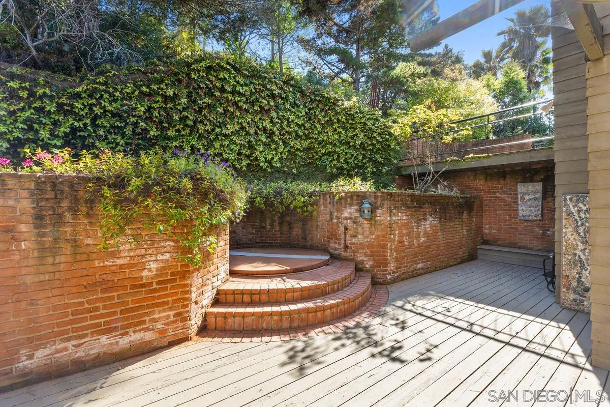 1888 Puente Drive La Jolla, CA 92037 - Photo 25 of 30 a view of a pathway both side of building