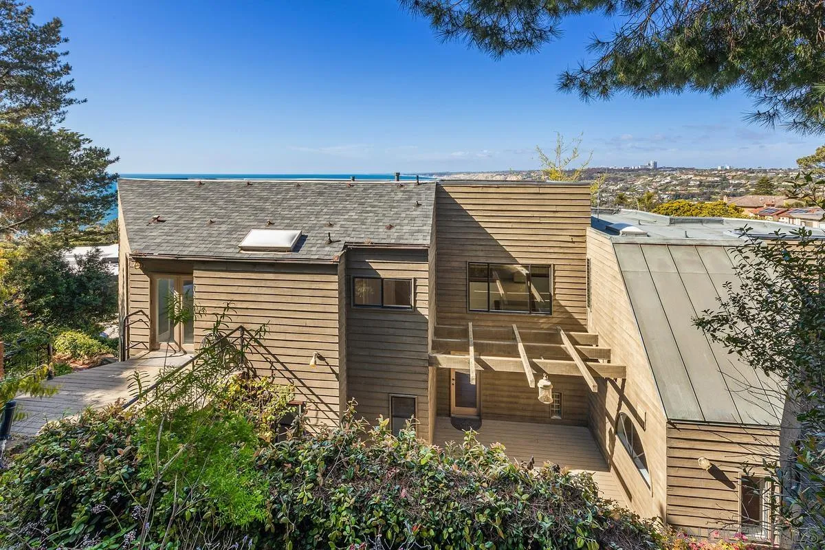 1888 Puente Drive La Jolla, CA 92037 - Photo 27 of 30 front view of a house with a yard