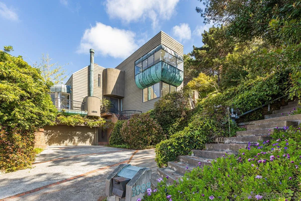 1888 Puente Drive La Jolla, CA 92037 - Photo 6 of 30 a front view of a house with a yard and outdoor space
