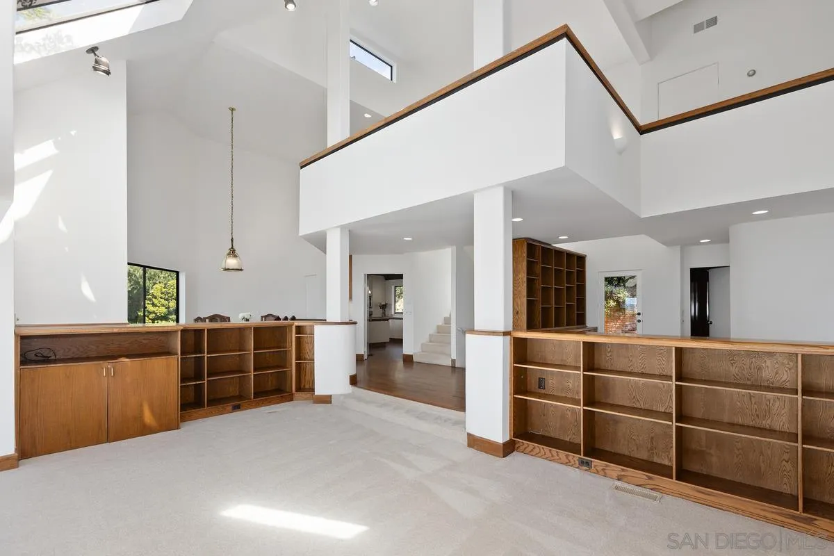 1888 Puente Drive La Jolla, CA 92037 - Photo 10 of 30 a room with furniture a window and dresser