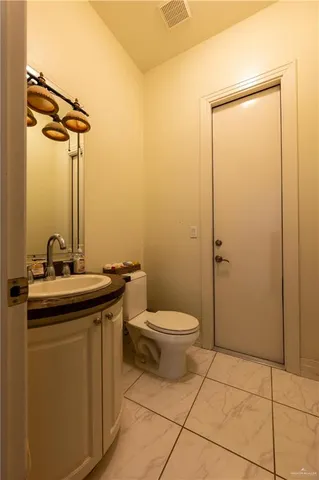 a view of a bedroom with furniture wooden floor and window