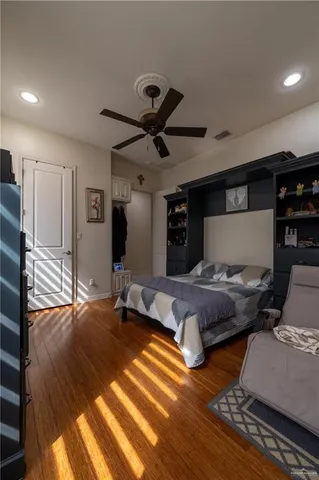 a view of a double sink and chair in a room