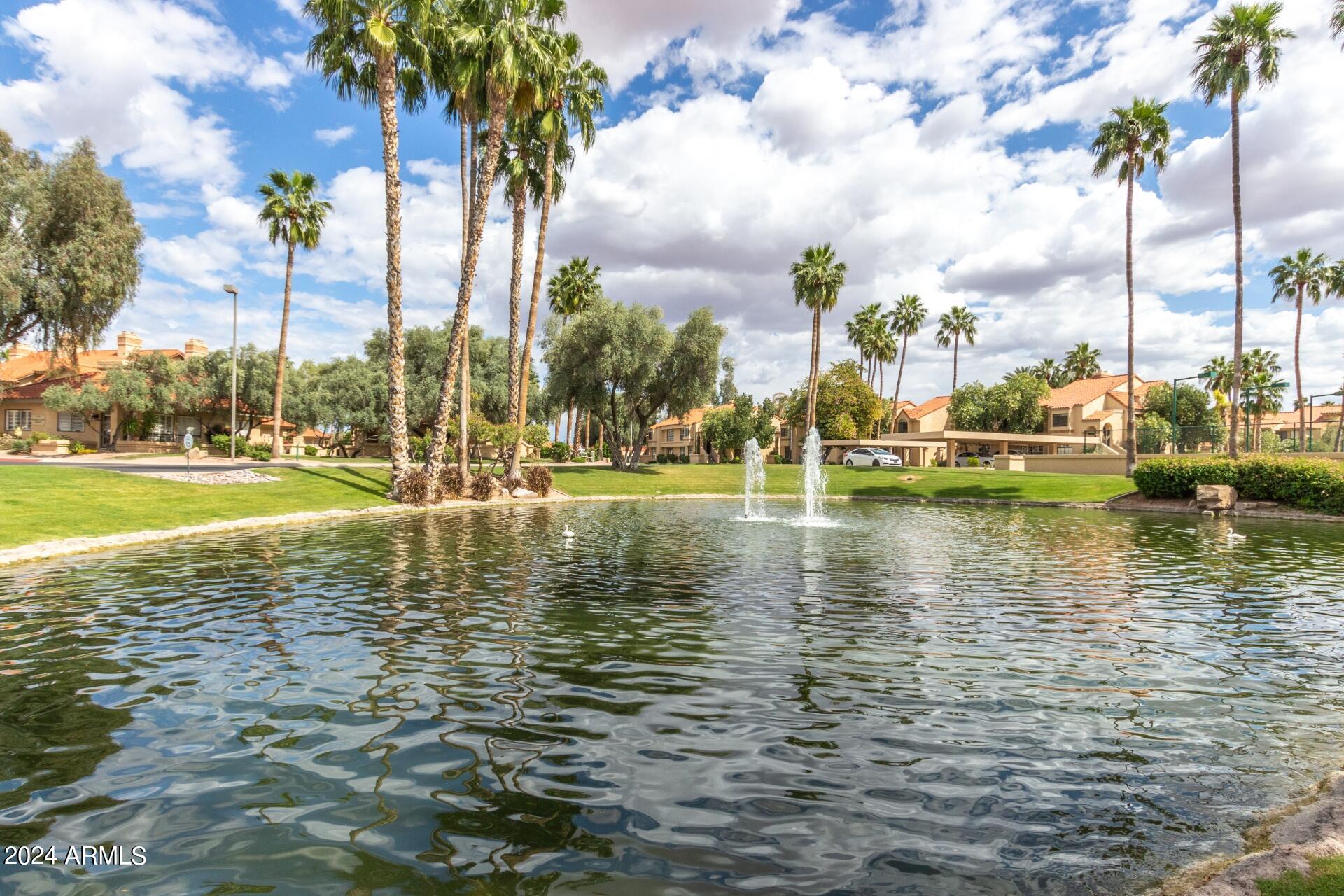 9705 East Mountain View Road, Unit 1036 Scottsdale, AZ 85258 - Photo 29 of 50 a view of a water with an outdoor space